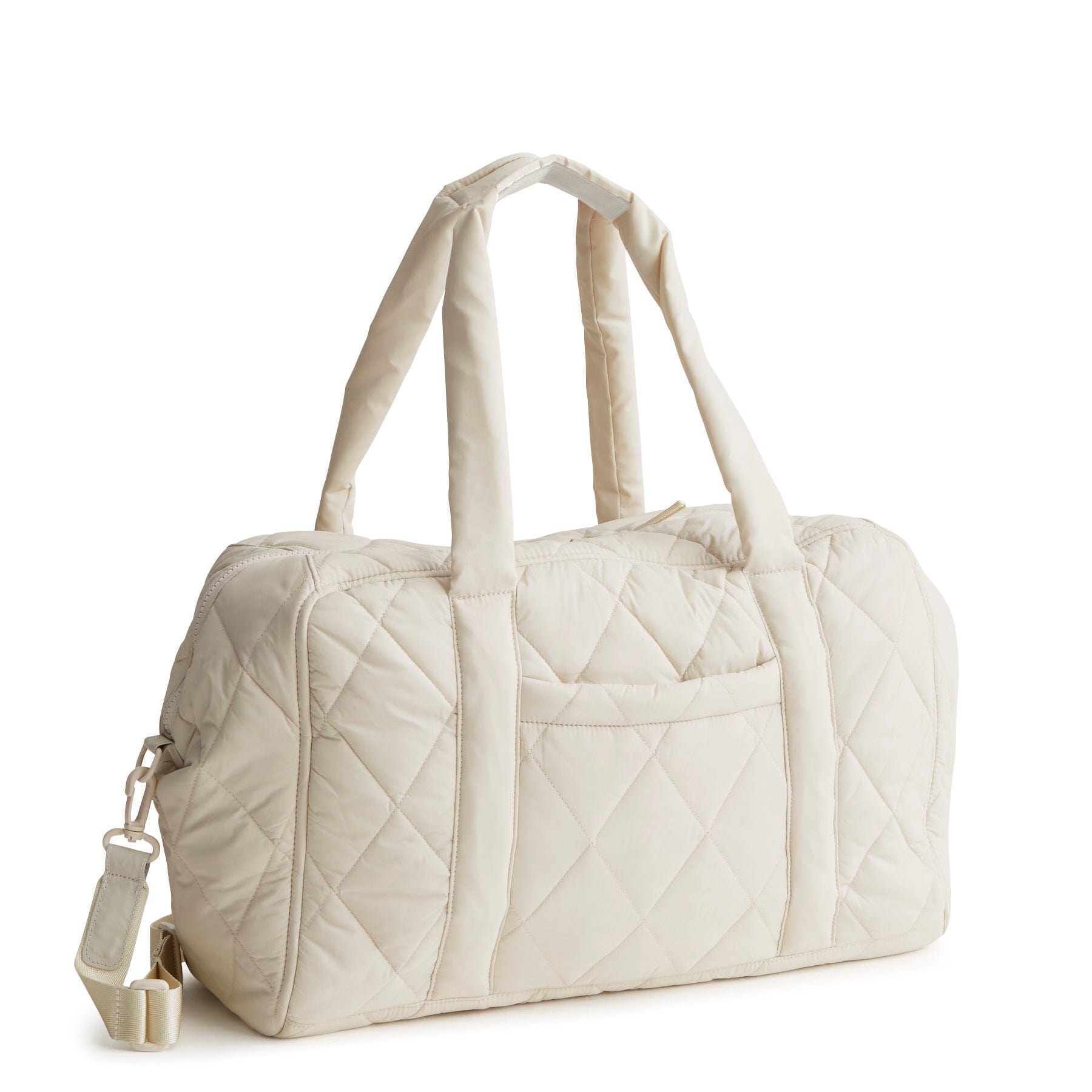 quilted white weekender bag with handles and adjustable strap