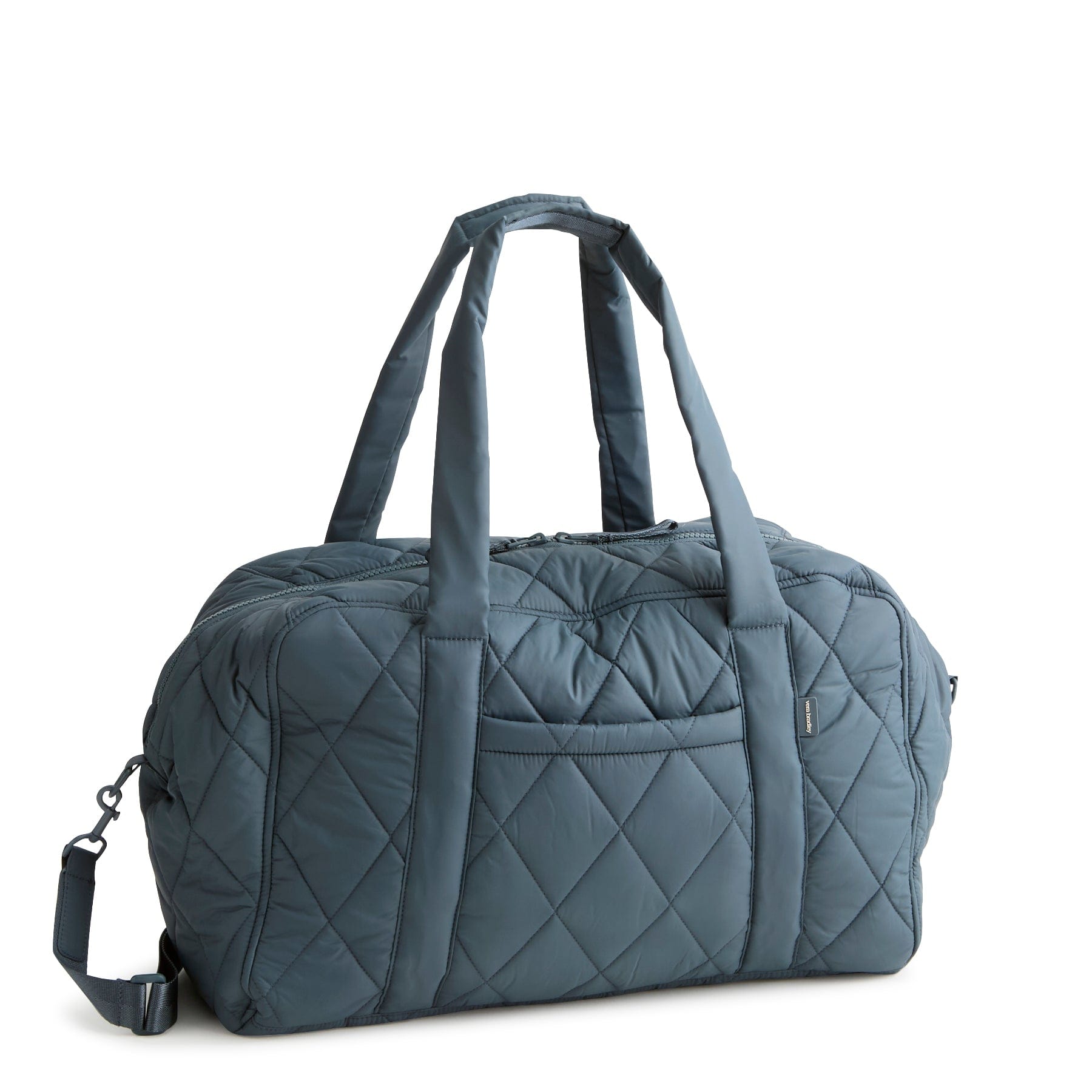 slate blue quilted duffel bag with large handle, adjustable strap and exterior pockets
