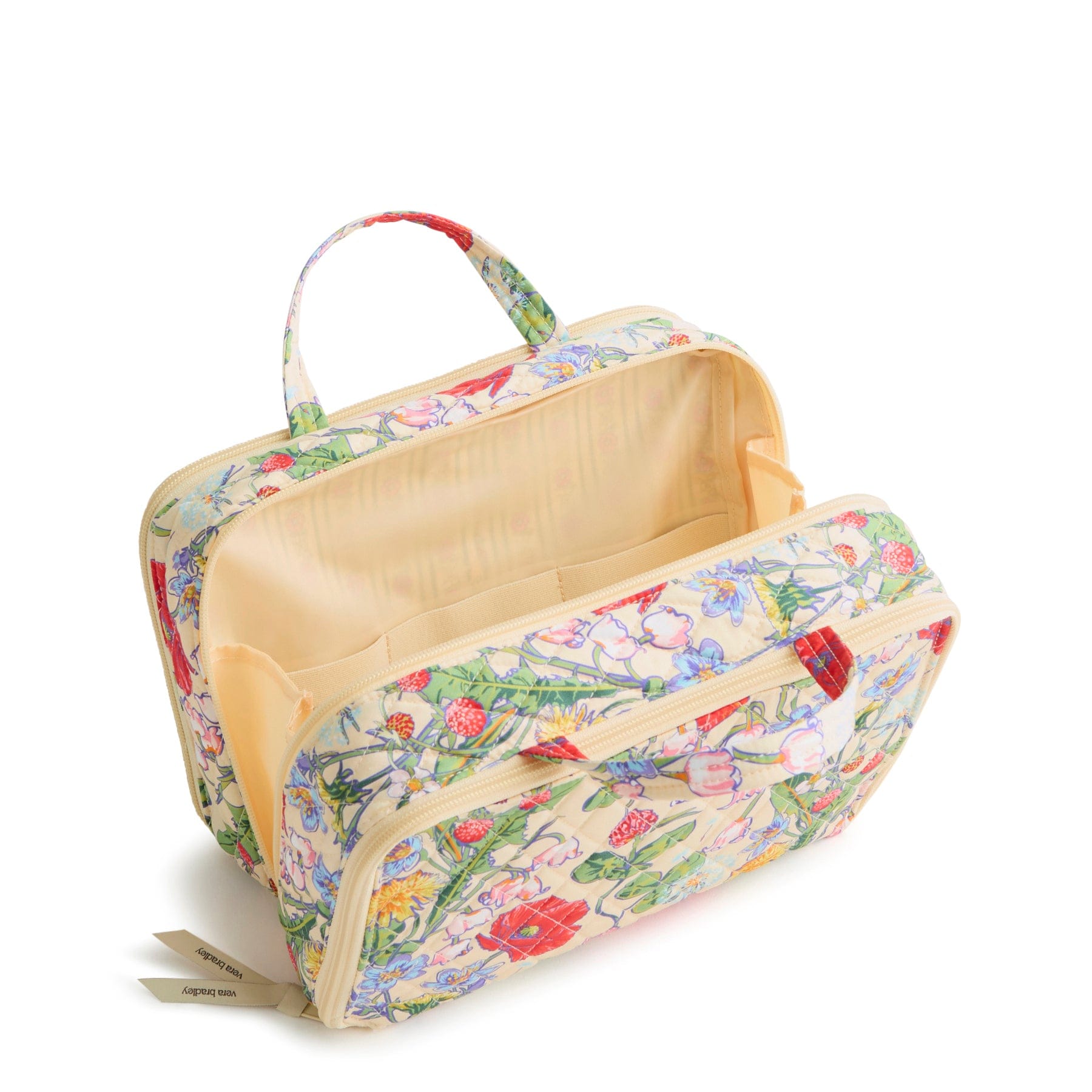 cotton travel case in wildflowers pattern show open with slip pockets inside