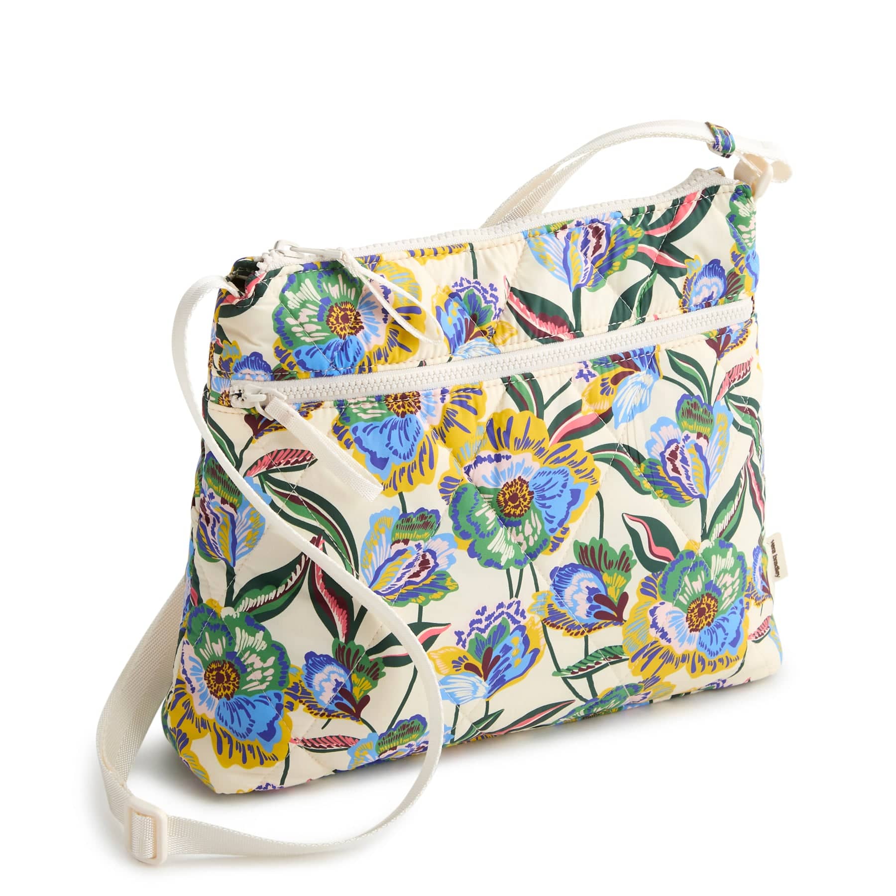 large cream colored crossbody bag with green and yellow floral gardenia pattern
