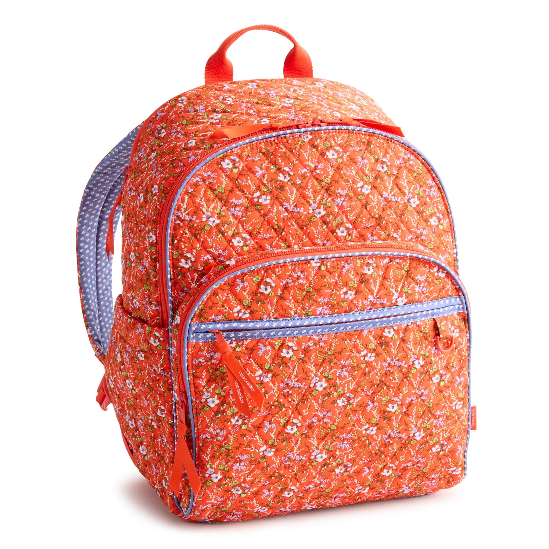 red quilted cotton backpack with small white flowers pattern