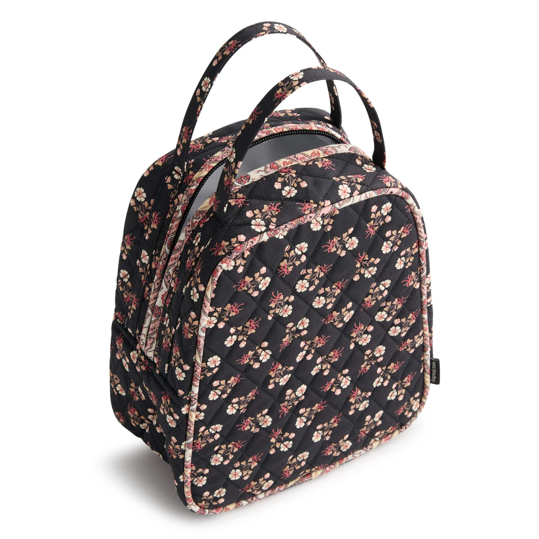 black quilted cotton lunch bag with small pink flowers pattern and two handles shown unzipped