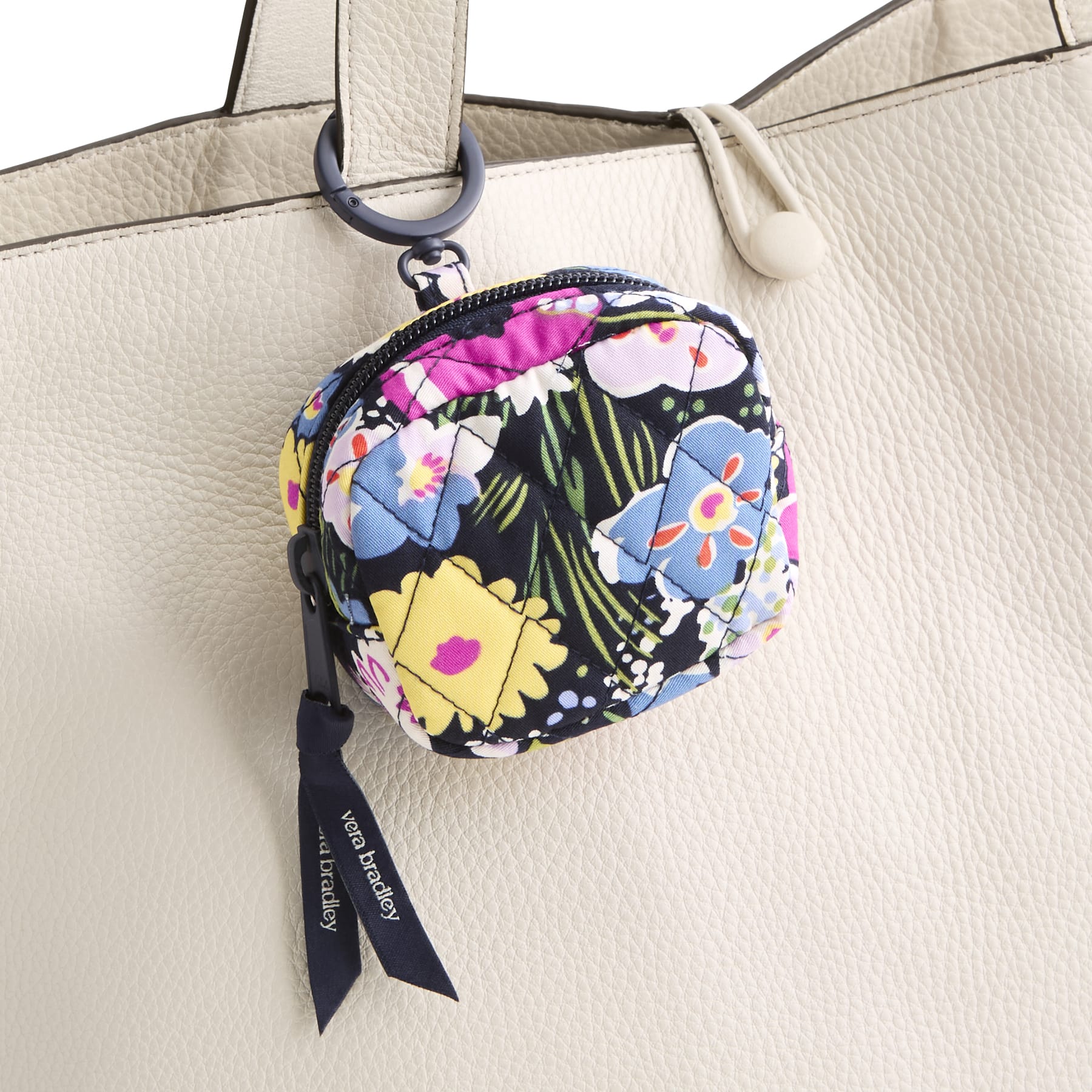 small quilted cotton earbuds case with ring attached to tote bag strap