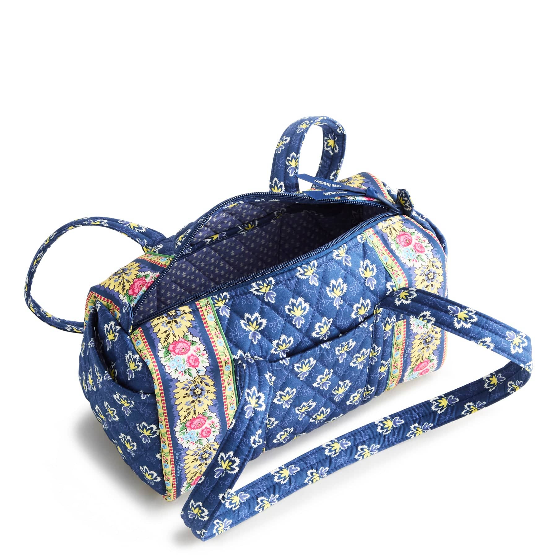 vera bradley original 100 handbag shown open in dark blue quilted cotton with yellow floral pattern