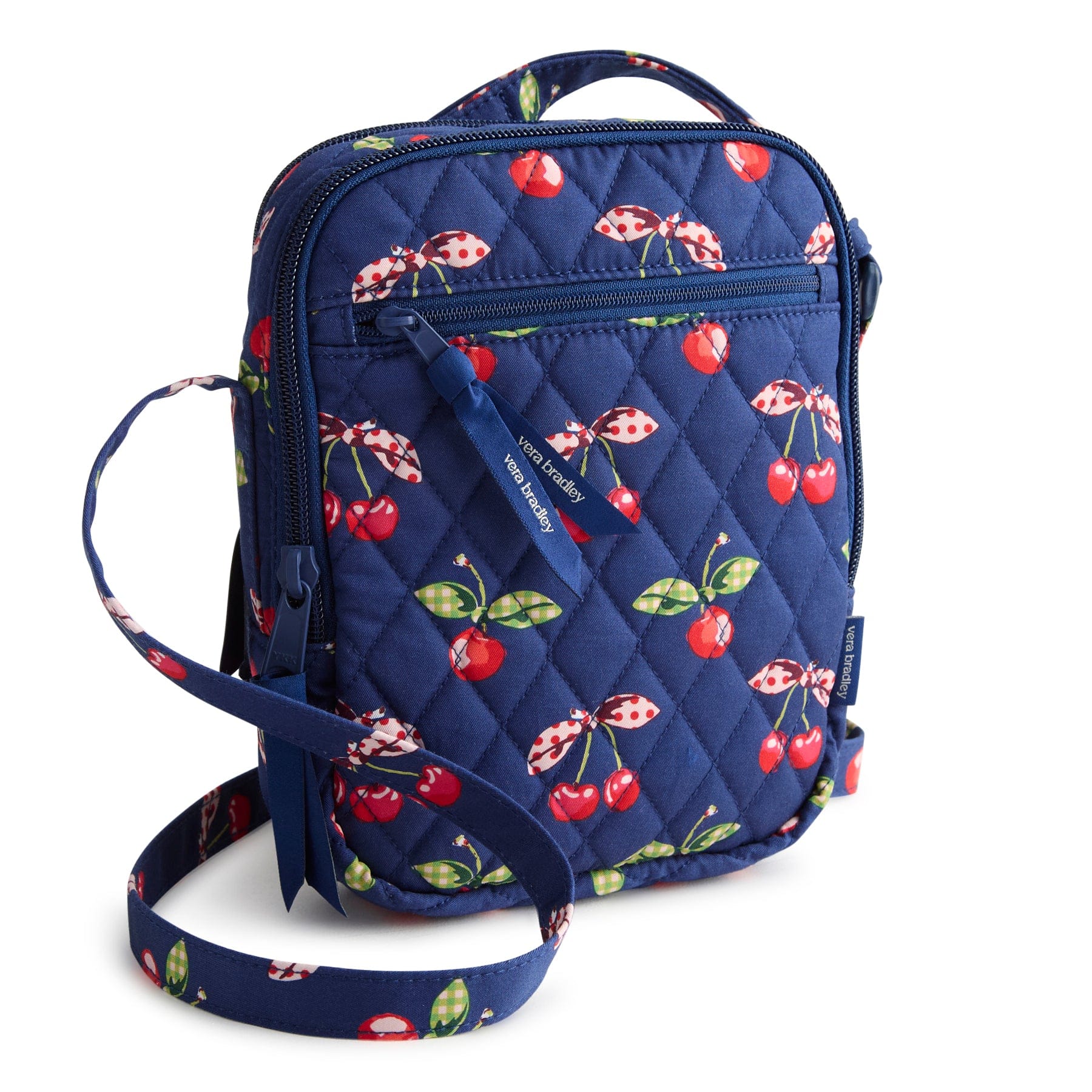small navy blue quilted cotton crossbody bag with cherries and bows pattern