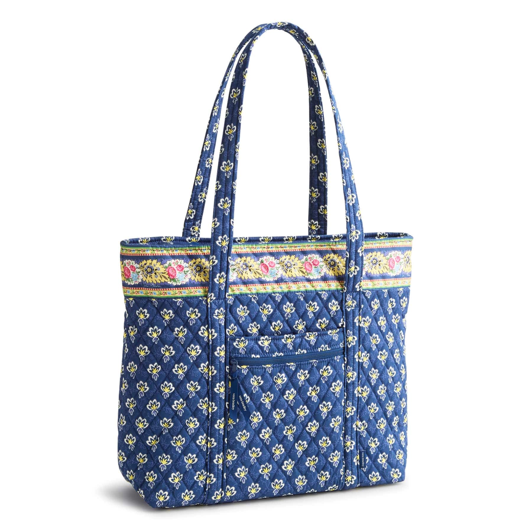 blue quilted cotton tote bag with two handles and white and yellow floral pattern