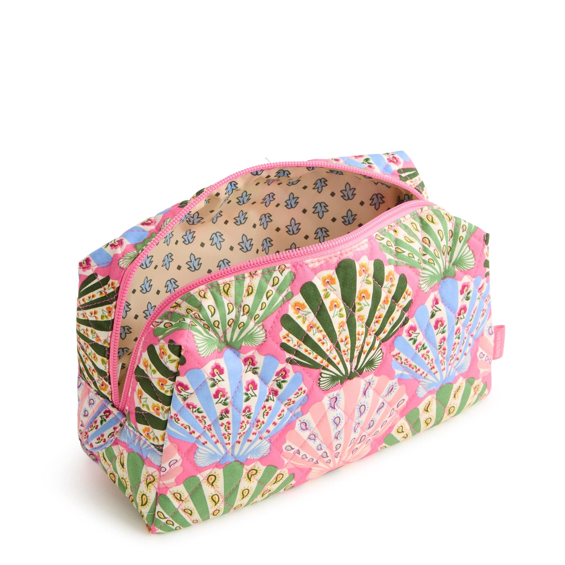 medium size pink quilted cotton makeup bag with colorful shells pattern shown unzipped with yellow and blue pattern inside