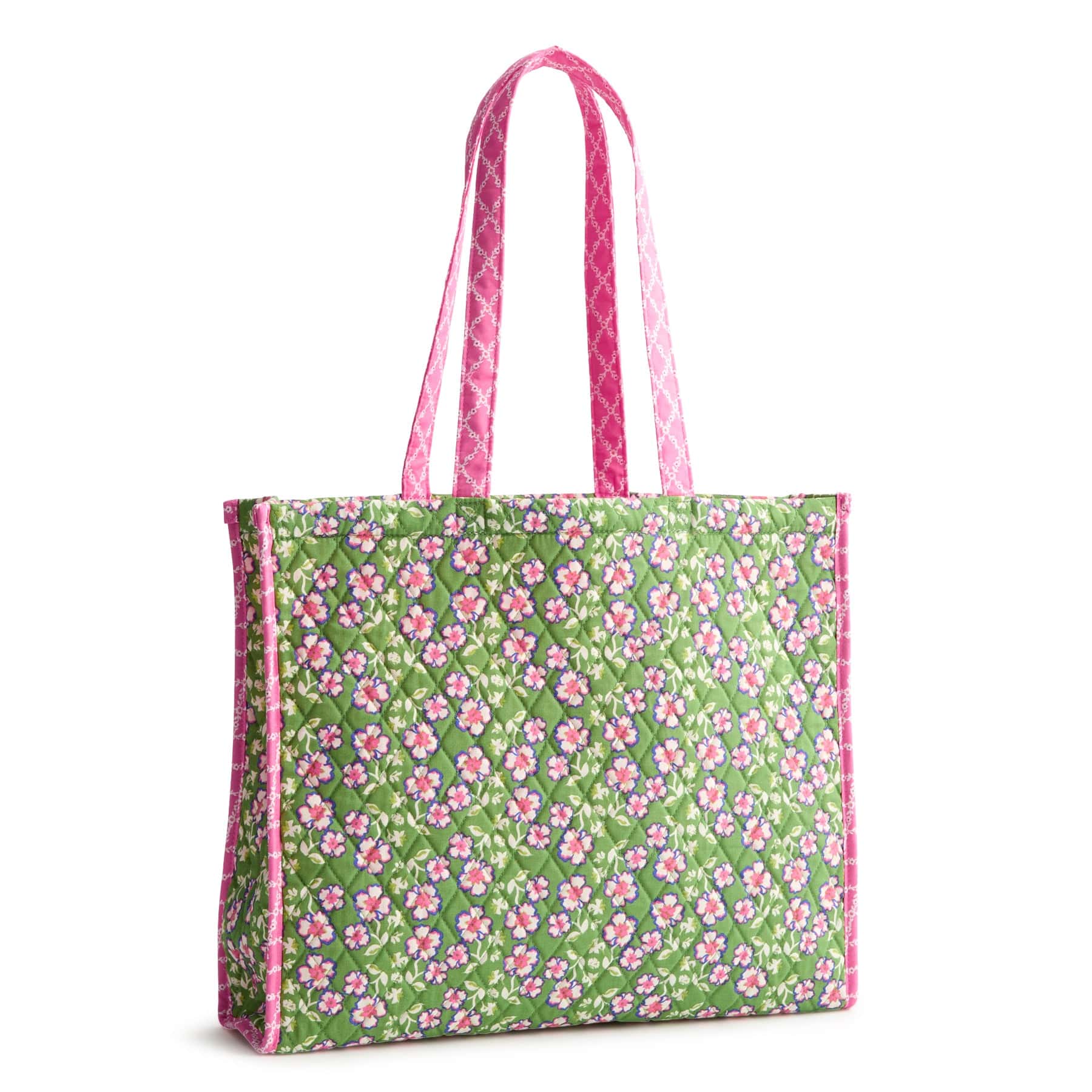 wide green quilted cotton tote back with pink flowers pattern, pink edging and pink handles