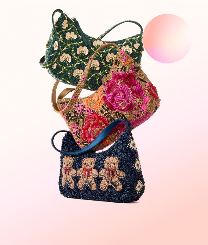 Handbags. Shop Now.